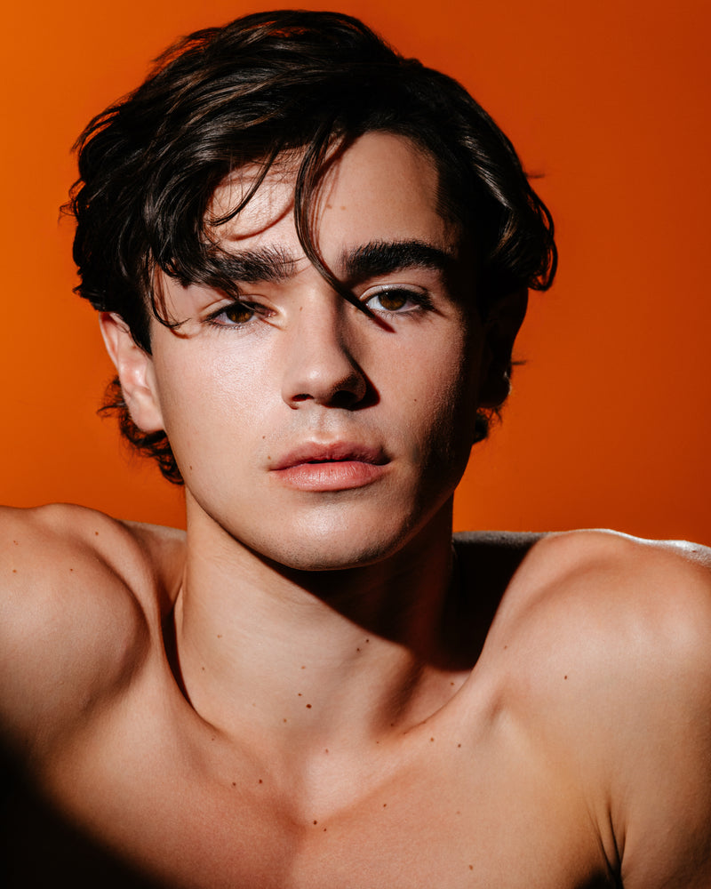 Male model wearing makeup